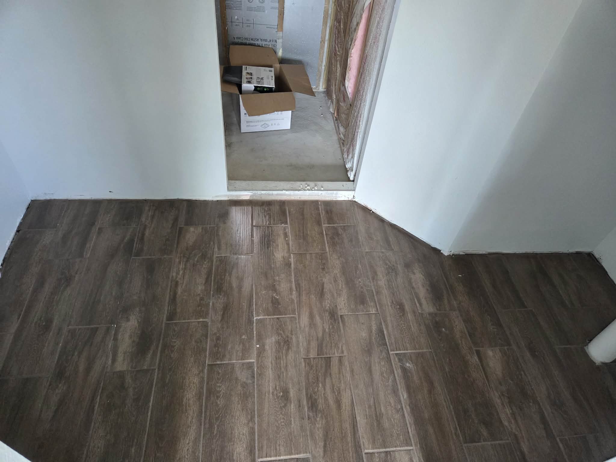 Tile and hardwood flooring project by To The Rescue LLC Florida